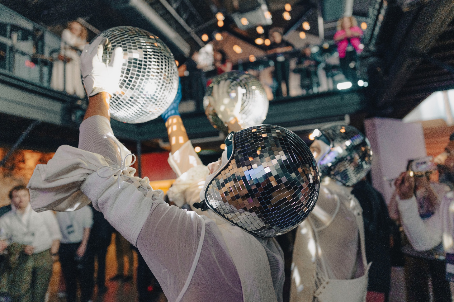 Disco-ball performers at the Interstella Summit closing party